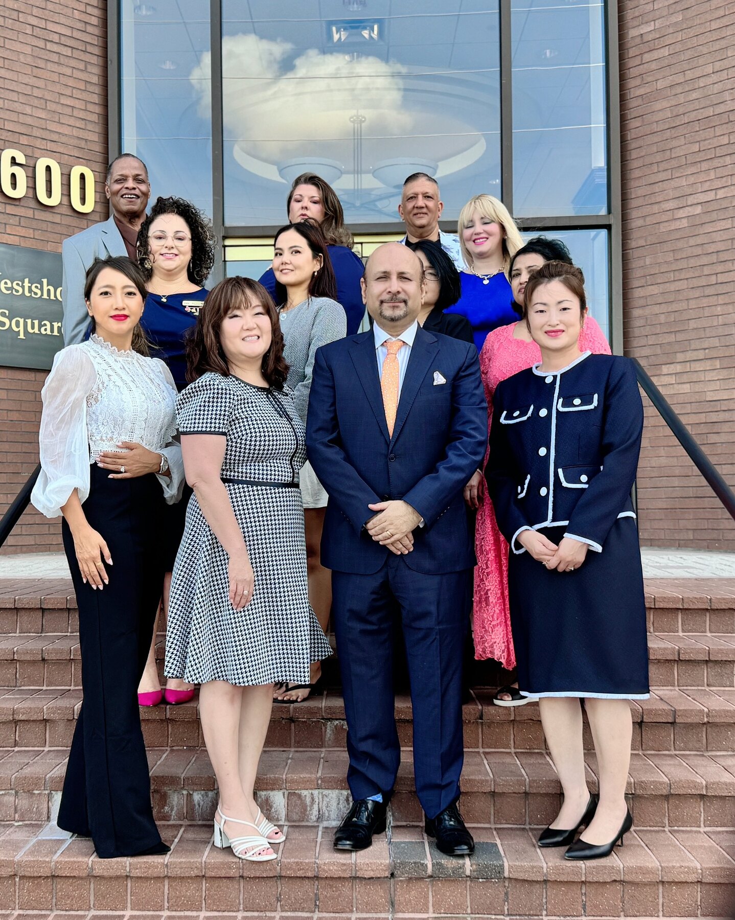 The Melange team gathered outside the Tampa office